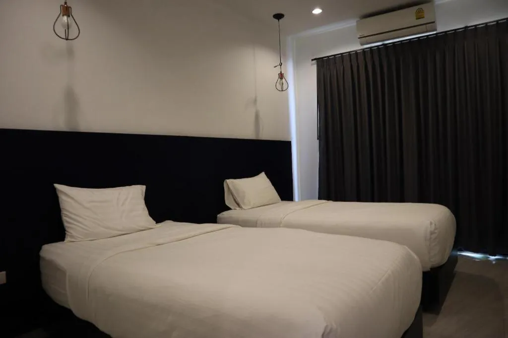 Bed in Chic-Chidkong Boutique Hotel
