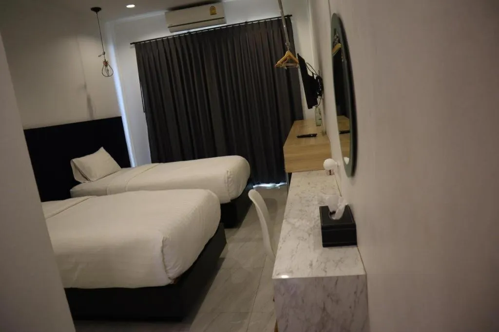 Bed in Chic-Chidkong Boutique Hotel