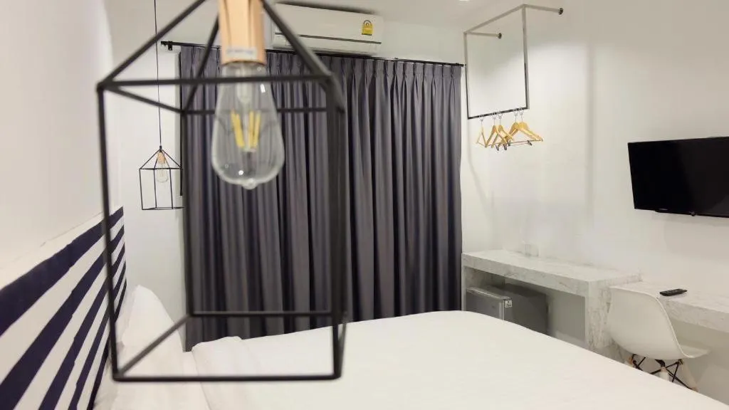 Bed in Chic-Chidkong Boutique Hotel