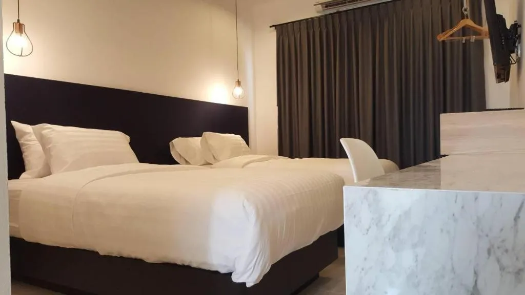 Bed in Chic-Chidkong Boutique Hotel