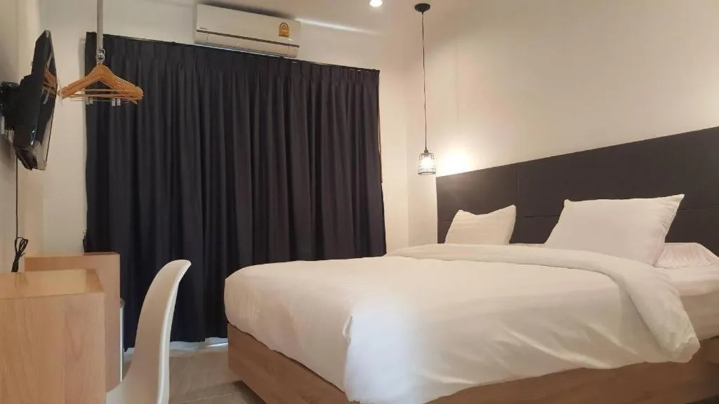 Bed in Chic-Chidkong Boutique Hotel