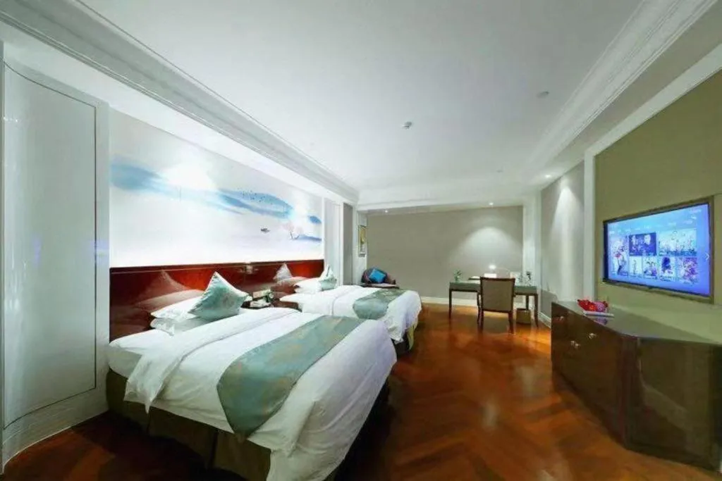 Bed in GreenTree Eastern Yancheng Binhai County Aobaolia Beichen Hotel