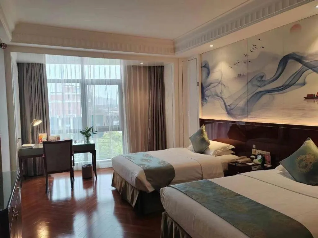 Bed in GreenTree Eastern Yancheng Binhai County Aobaolia Beichen Hotel