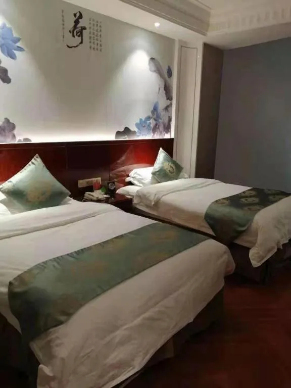 Bed in GreenTree Eastern Yancheng Binhai County Aobaolia Beichen Hotel