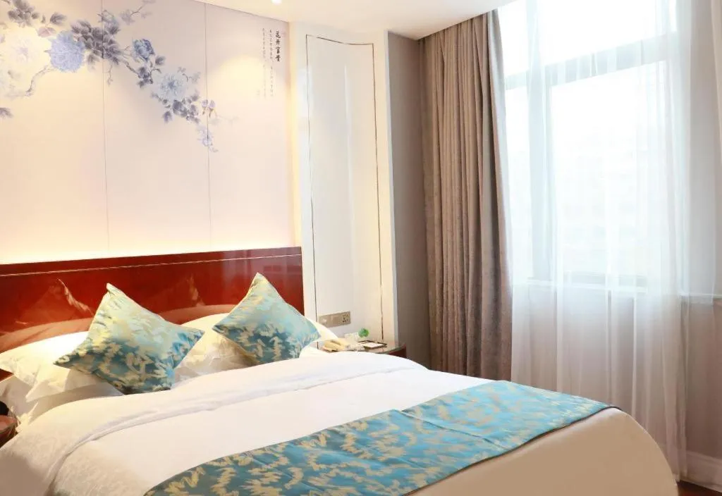 Bed in GreenTree Eastern Yancheng Binhai County Aobaolia Beichen Hotel