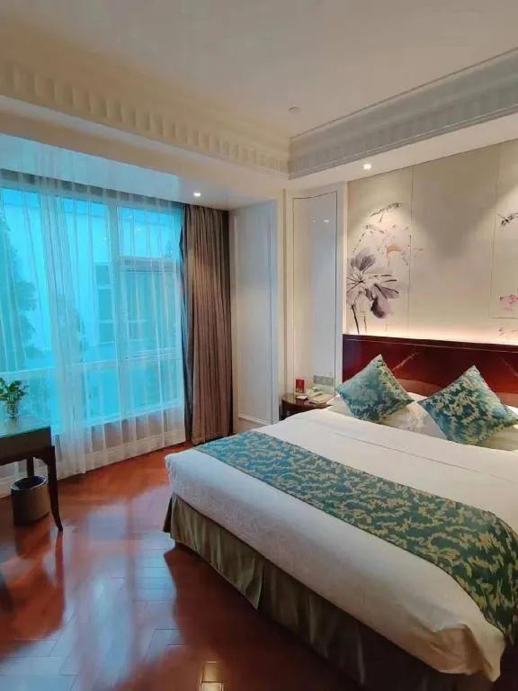 Bed in GreenTree Eastern Yancheng Binhai County Aobaolia Beichen Hotel