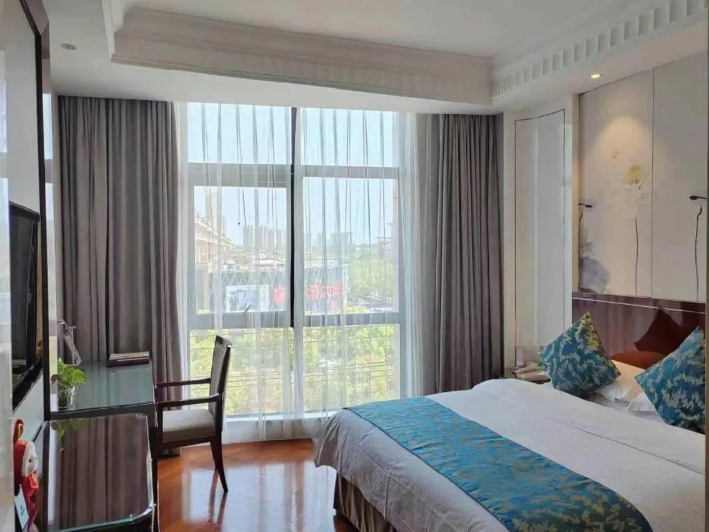 Bed in GreenTree Eastern Yancheng Binhai County Aobaolia Beichen Hotel