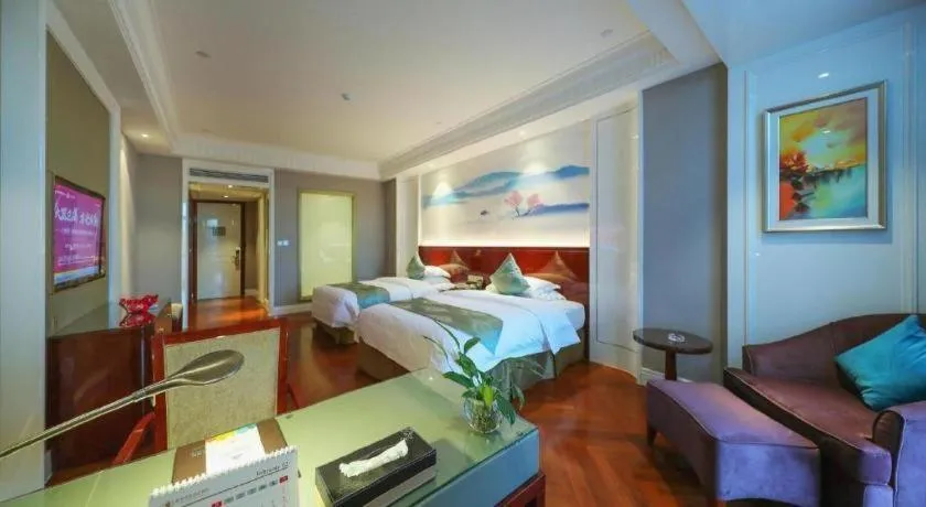 Bed in GreenTree Eastern Yancheng Binhai County Aobaolia Beichen Hotel