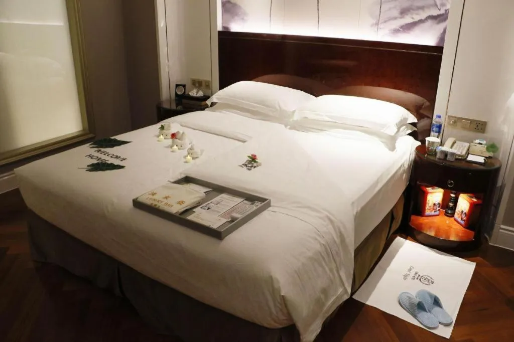 Bed in GreenTree Eastern Yancheng Binhai County Aobaolia Beichen Hotel