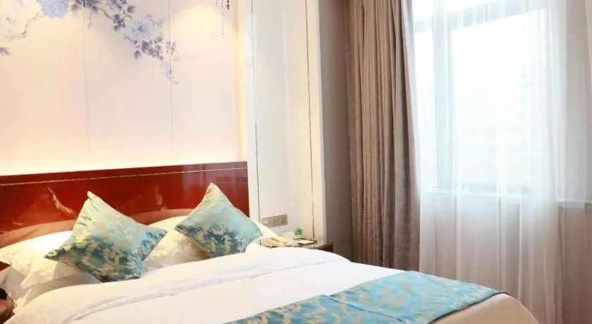 Bed in GreenTree Eastern Yancheng Binhai County Aobaolia Beichen Hotel