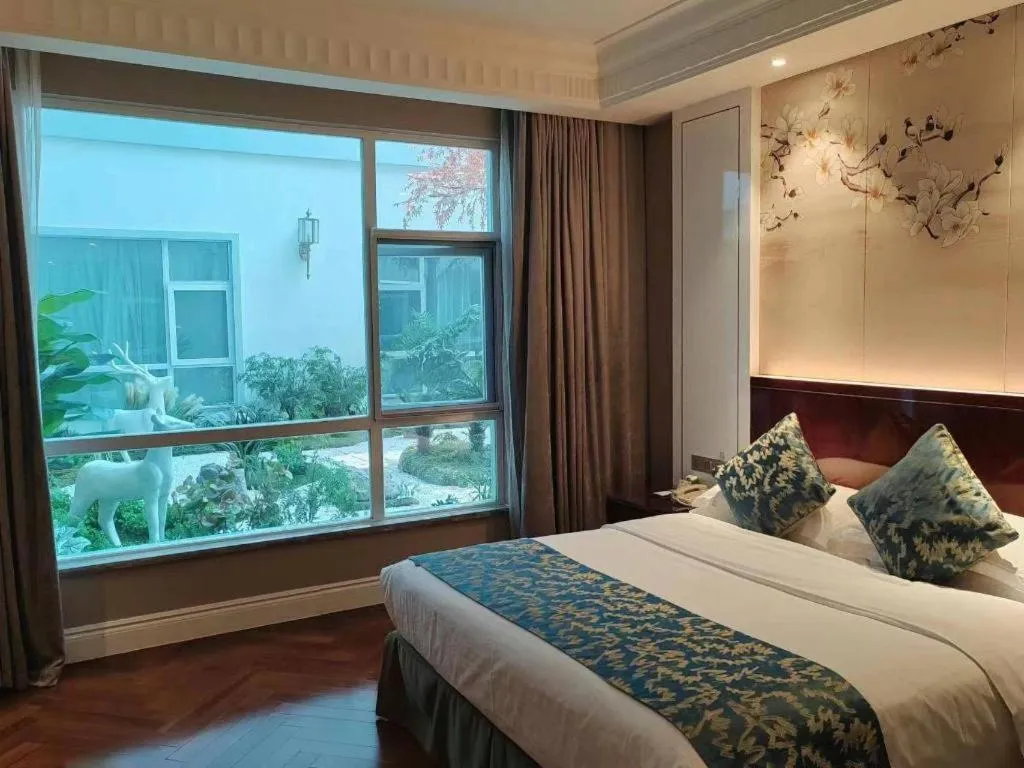 Bed in GreenTree Eastern Yancheng Binhai County Aobaolia Beichen Hotel