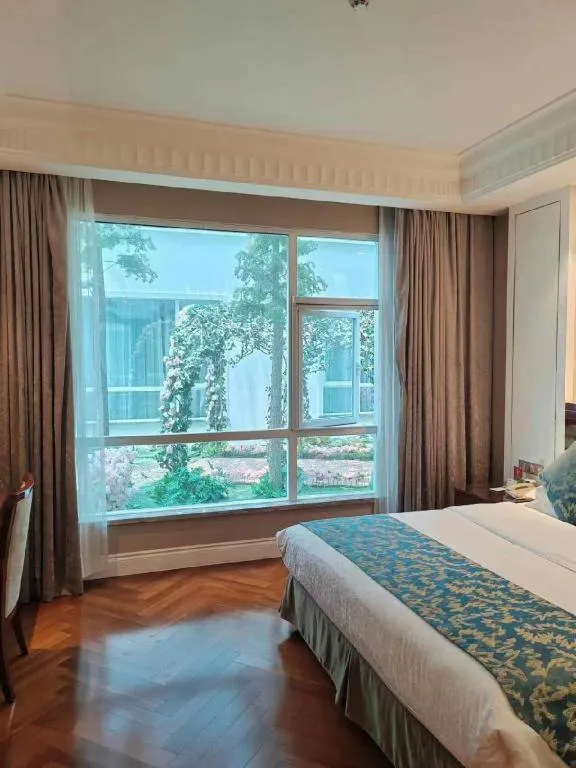 Bed in GreenTree Eastern Yancheng Binhai County Aobaolia Beichen Hotel