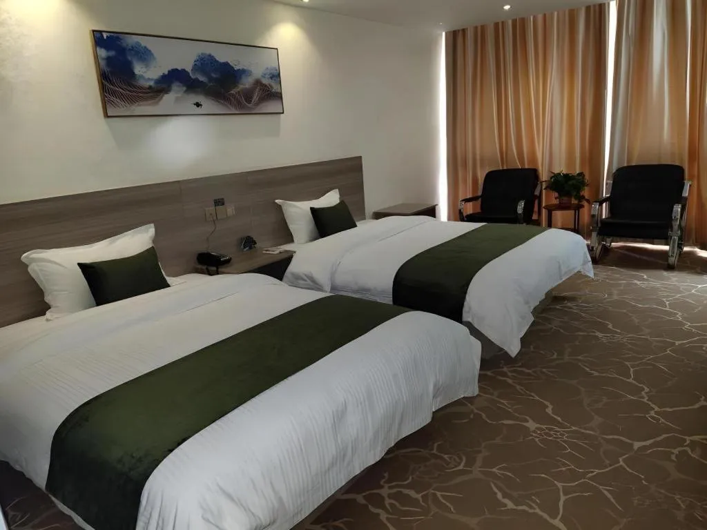 Bed in GreenTree Inn Yancheng Xiangshui Bus Station Express Hotel