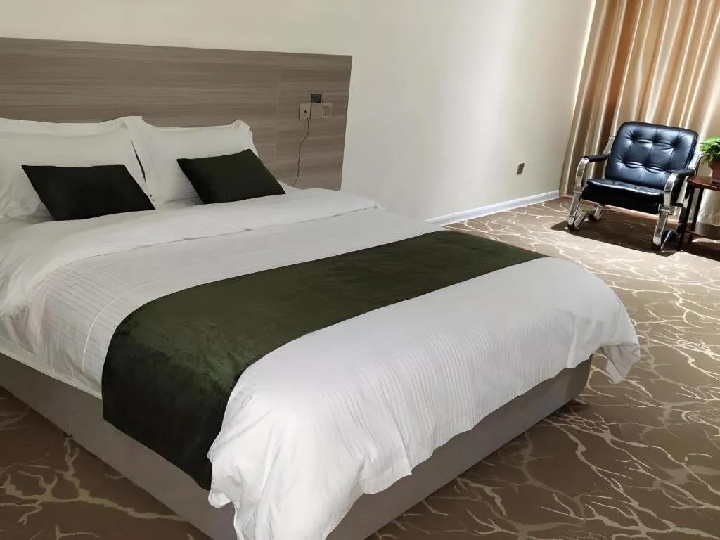 Bed in GreenTree Inn Yancheng Xiangshui Bus Station Express Hotel