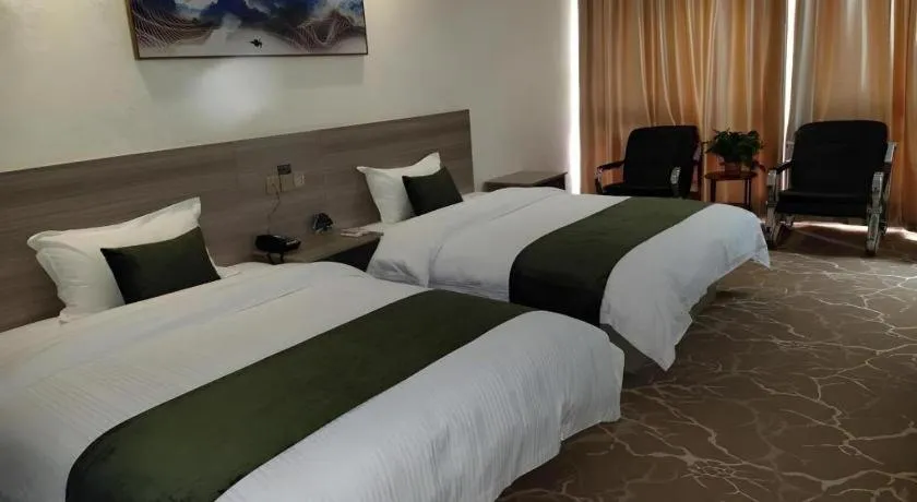 Bed in GreenTree Inn Yancheng Xiangshui Bus Station Express Hotel