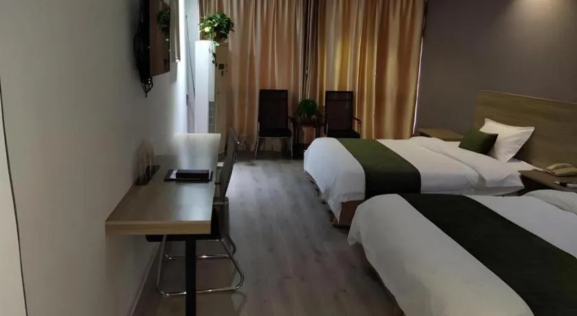 Bed in GreenTree Inn Yancheng Xiangshui Bus Station Express Hotel
