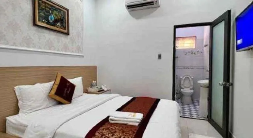 Bed in Hoang Mai Hotel