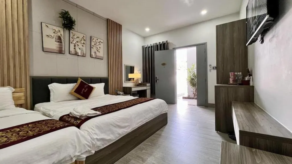 Bed in Hoang Mai Hotel