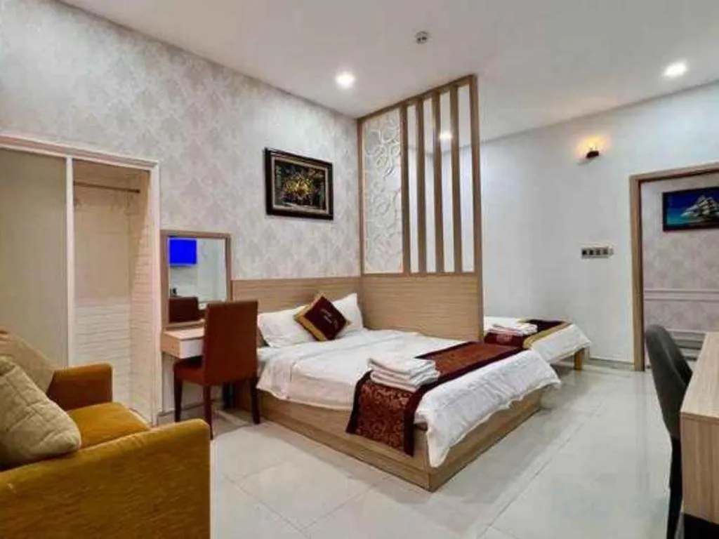 Bed in Hoang Mai Hotel