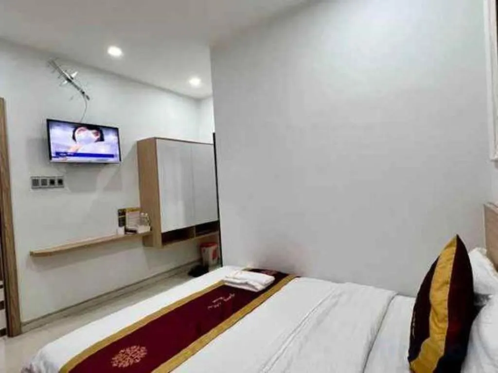 Bed in Hoang Mai Hotel