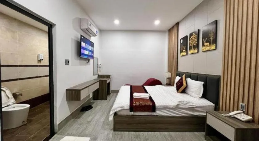 Bed in Hoang Mai Hotel