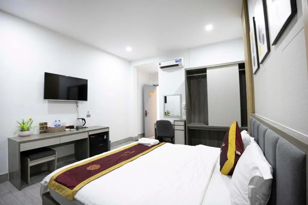 Bed in Hoang Mai Hotel