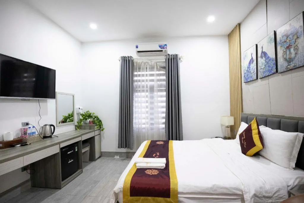 Bed in Hoang Mai Hotel