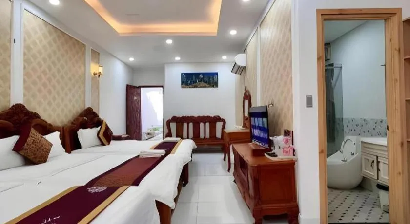 Bed in Hoang Mai Hotel