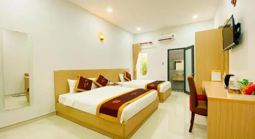 Bed in Hoang Mai Hotel