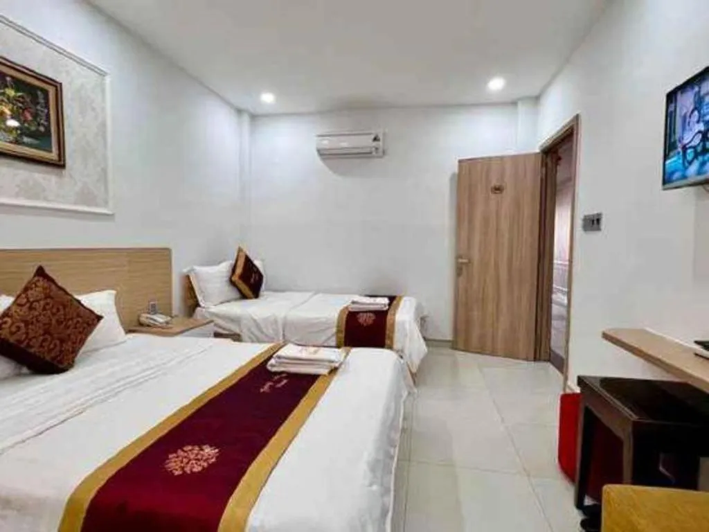 Bed in Hoang Mai Hotel