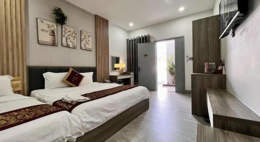 Bed in Hoang Mai Hotel