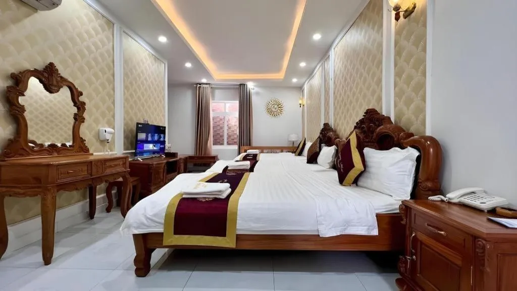 Bed in Hoang Mai Hotel