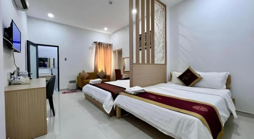 Bed in Hoang Mai Hotel