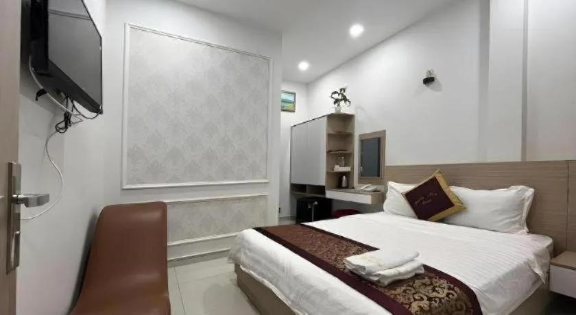 Bed in Hoang Mai Hotel