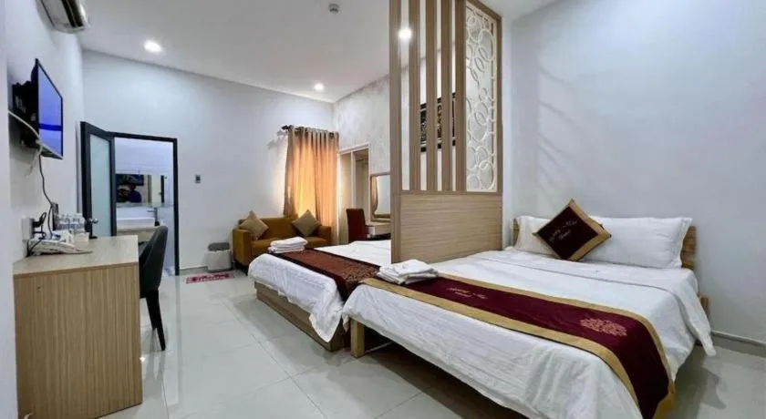 Bed in Hoang Mai Hotel