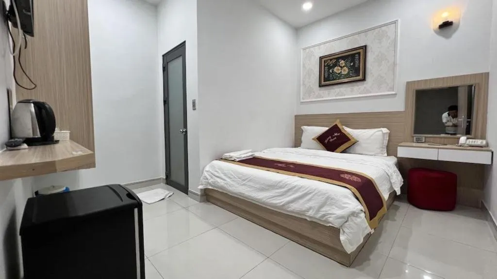 Bed in Hoang Mai Hotel