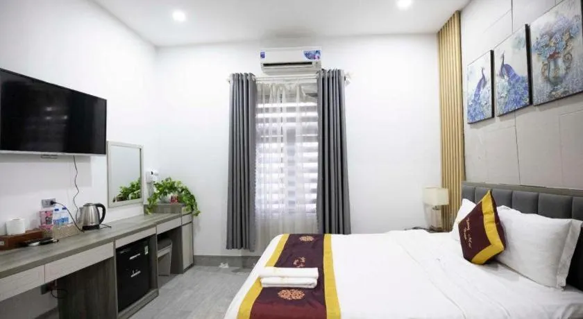 Bed in Hoang Mai Hotel