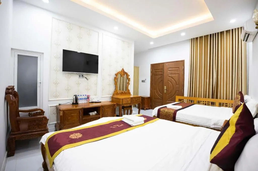 Bed in Hoang Mai Hotel