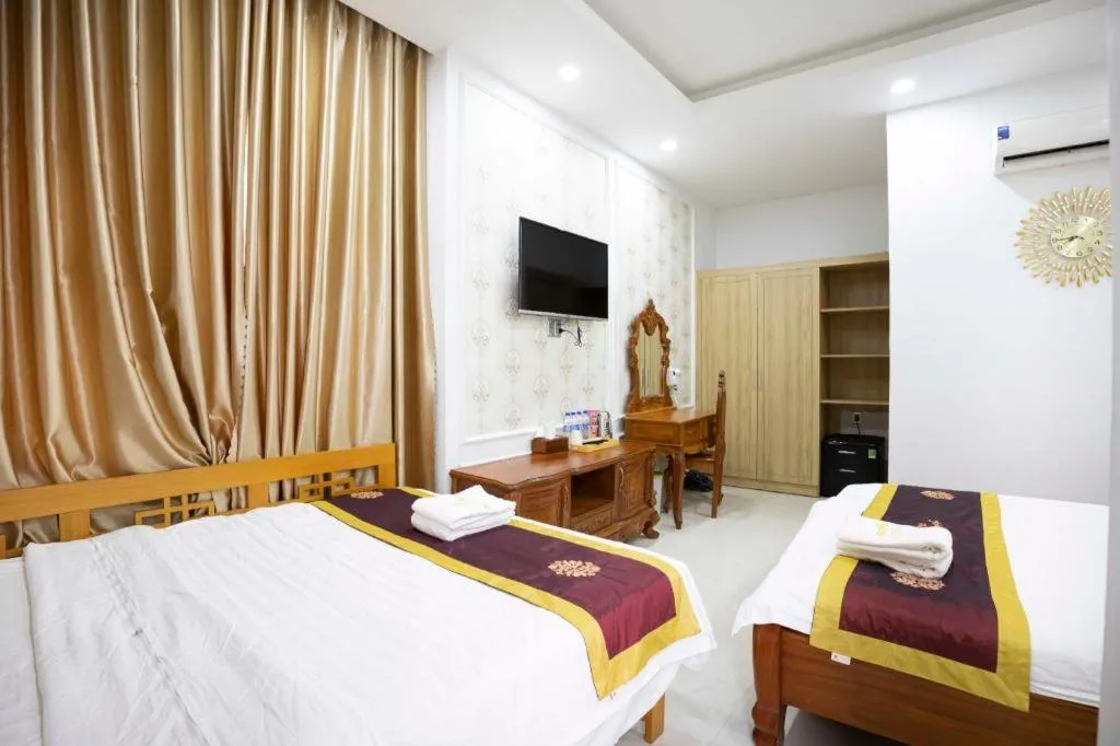 Bed in Hoang Mai Hotel