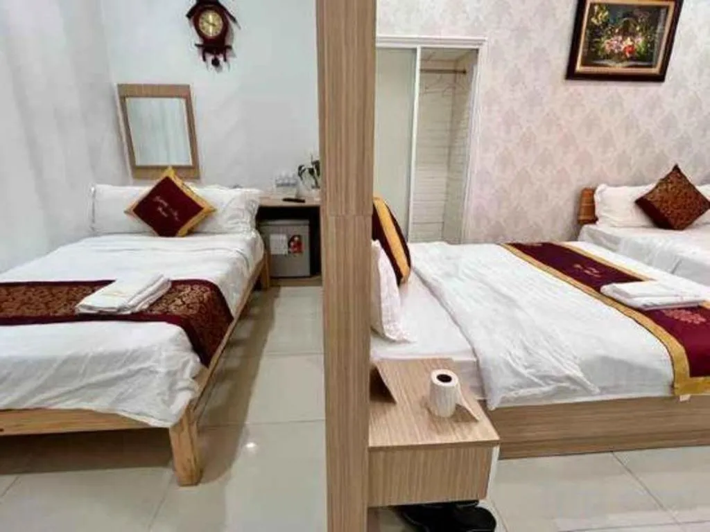 Bed in Hoang Mai Hotel