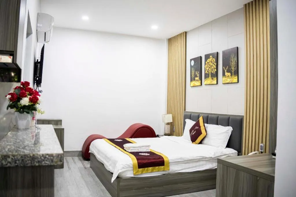 Bed in Hoang Mai Hotel