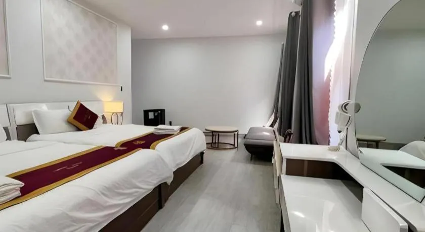 Bed in Hoang Mai Hotel