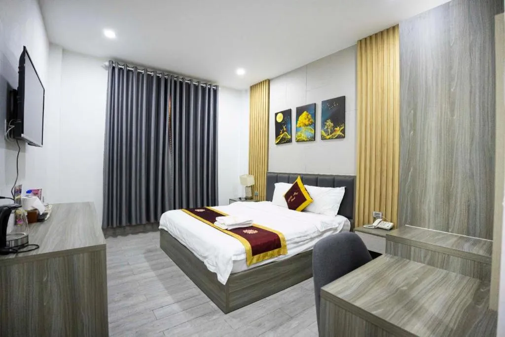 Bed in Hoang Mai Hotel