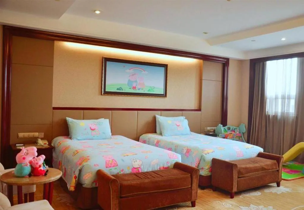 Bed in Chutian Guangdong International Hotel