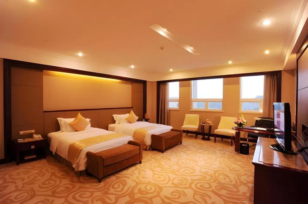 Bed in Chutian Guangdong International Hotel