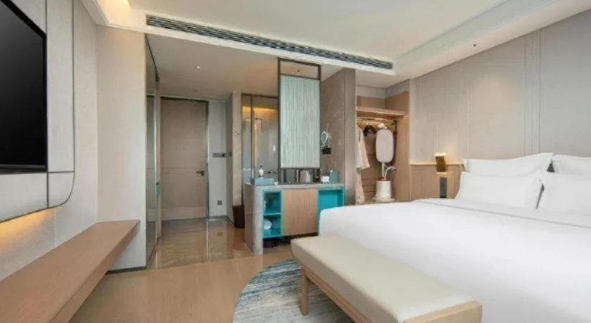 Bed in Chutian Guangdong International Hotel