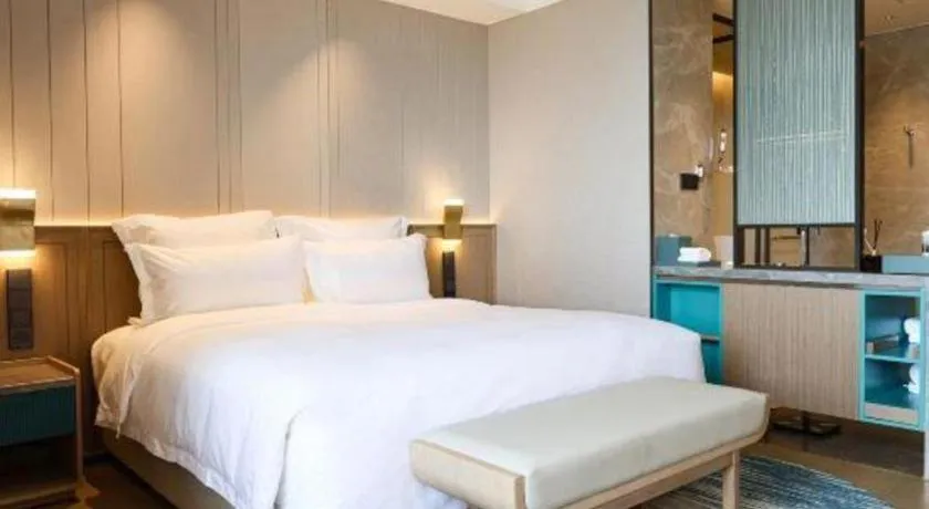 Bed in Chutian Guangdong International Hotel