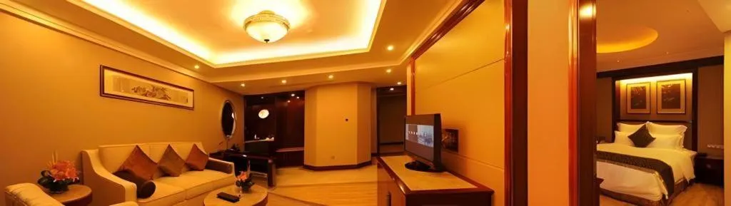 Bed in Chutian Guangdong International Hotel