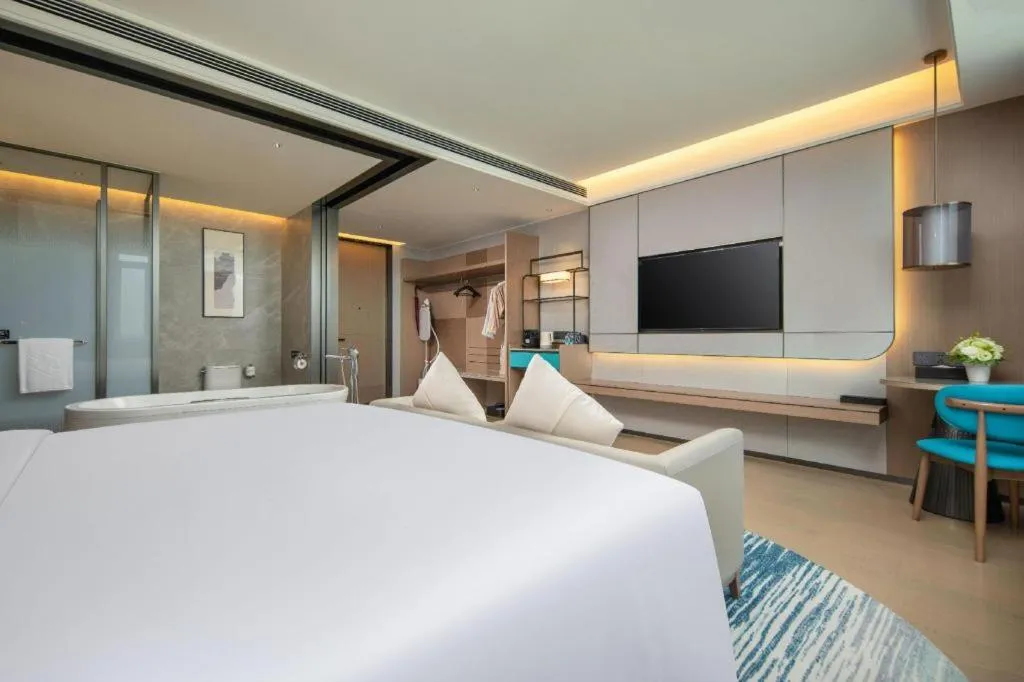 Bed in Chutian Guangdong International Hotel