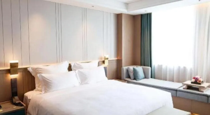 Bed in Chutian Guangdong International Hotel
